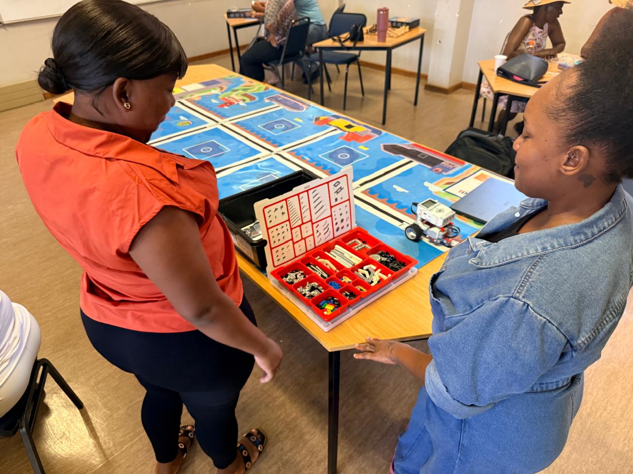 Learners collaborating on a robotics build